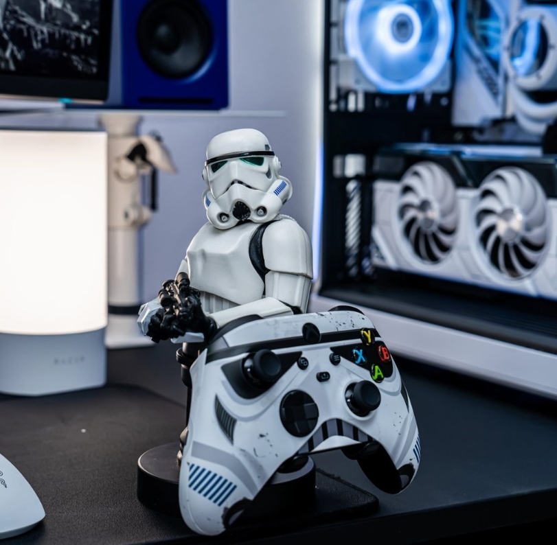 Licensed Star Wars Stormtrooper controller holder figurine displayed in gaming setup