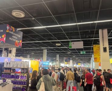 Crowds exploring booths in the Innovation Area at FIBO 2025.