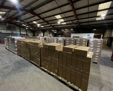 Packed pallets of ecommerce orders in Meteor Space warehouse during Black Friday weekend.
